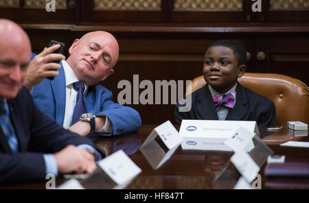 Astronaut Mark Kelly, takes a selfie with Kid Science Advisor Jacob Leggette during a meeting with ten other Kid Science Advisors to discuss what they think is important in science, technology, and innovation, Friday, October 21, 2016 at the White House. After a question from Jacob at the White House Science Fair about whether President Obama had a Kid Science Advisor, the White House launched a Kid Science Advisor campaign, which drew over 2,500 ideas from students about science and STEM education. Aubrey Gemignani) Stock Photo