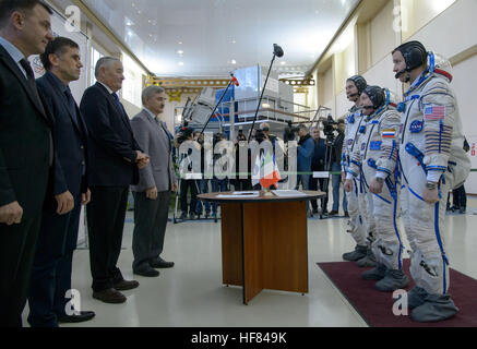 Expedition 50 backup crew members, ESA astronaut Paolo Nespoli, left, Russian Russian cosmonaut Fyodor Yurchikhin of Roscosmos, center, and NASA astronaut Jack Fischer meet with mission managers during their Soyuz qualification exams, Monday, Oct. 24, 2016, at the Gagarin Cosmonaut Training Center (GCTC) in Star City, Russia. Stock Photo