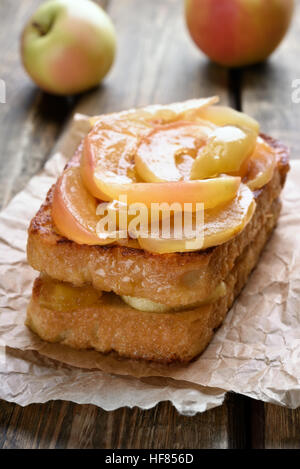 Sweet sandwiches, caramelized apples on toast bread, shallow depth of field Stock Photo