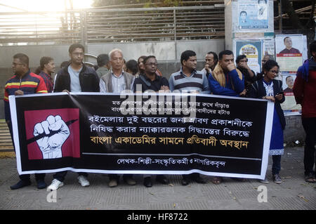 Dhaka, Bangladesh. 27th Dec, 2016. Bangladeshi writers, culture and eminent personalities and activists protest near in front of Bangla Academy against its decision to ban publishing house Sraban Prokashoni in the Ekushey Book Fair for two years. © Md. Mehedi Hasan/Pacific Press/Alamy Live News Stock Photo