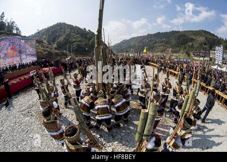 Congjiang, China. 27th Dec, 2016. More than 2,000 people of ethnic minorities attend the reed-pipe wind instrument playing competition in Congjiang, southwest China's Guizhou Province, December 27th, 2016. It's local tradition to hold reed-pipe wind instrument playing competition, celebrating the harvest and upcoming New Year. © SIPA Asia/ZUMA Wire/Alamy Live News Stock Photo