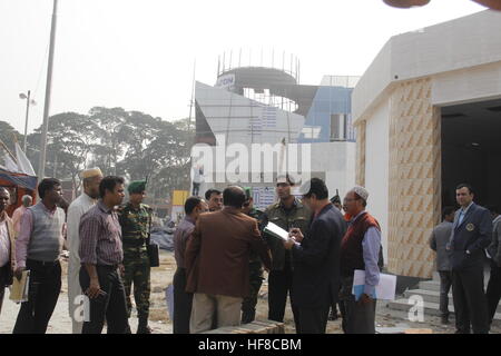Dhaka, Bangladesh. 1st Jan, 2017. Local officials, law enforcers and army personnel inspect the security arrangement at the site of the Dhaka International Trade Fair in Dhaka, Bangladesh, Dec. 28, 2016. The month-long Dhaka International Trade Fair, the biggest fair in Bangladesh, will kick off on Jan. 1, 2017. © Mohammad Manowar Kamal/Xinhua/Alamy Live News Stock Photo