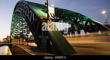 Sunderland, UK. 30th Dec, 2016. Daybreak over Wearmouth Bridge in Sunderland, England. The bridge was designed by Mott, Hay and Anderson and opened in 1929. © Stuart Forster/Alamy Live News Stock Photo