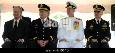 140526-N-PX557-174 EXETER, R.I. (May 26, 2014) Rhode Island Gov. Lincoln Chafee, Army Maj. Gen. Kevin McBride, Adjutant General of Rhode Island and Commanding General of the Rhode Island National Guard, Rear Adm. Walter E. “Ted” Carter Jr., president, U.S. Naval War College in Newport, Rhode Island, and retired Army Brig. Gen. Rick Braccus, participate in the 40th Annual Memorial Day Ceremony at Rhode Island Veterans Memorial Cemetery in Exeter, Rhode Island. This year, Carter joined with representatives from the State of Rhode Island, distinguished guests and more than 700 local attendees, to Stock Photo