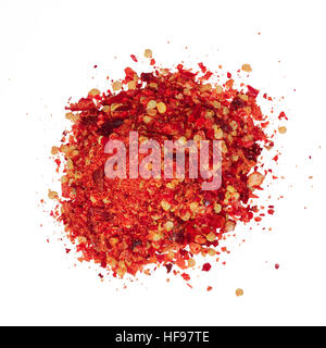 Pile of crushed red pepper (flakes, RPF), the dried and crushed cayennes with seeds. Clipping paths,top view Stock Photo