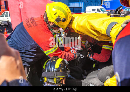 firemen during a car accident simulation Stock Photo