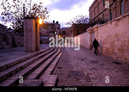 View of Via Dolorosa street believed to be the path that Jesus walked on the way to his crucifixion in the Old City. East Jerusalem, Israel Stock Photo