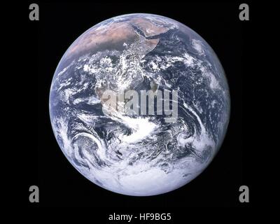 NASA Apollo 17 crew members capture a translunar coast photograph of the Earth extending from the Mediterranean Sea area to the Antartica south polar ice cap December 7, 1972 in Earth orbit. Although a heavy cloud covers the Southern Hemisphere the coastline of Africa, Arabian Peninsula, Malagasy Republic, and Asian mainland are clearly visible. Stock Photo