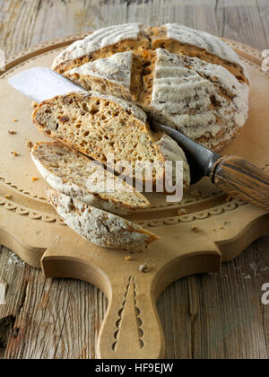 Artisan sour dough wholemeal seed bread with white, malted rye flour Stock Photo