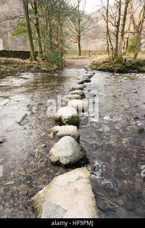 Stepping stones across the river Derwent in Borrowdale the Lake District Cumbria UK Stock Photo