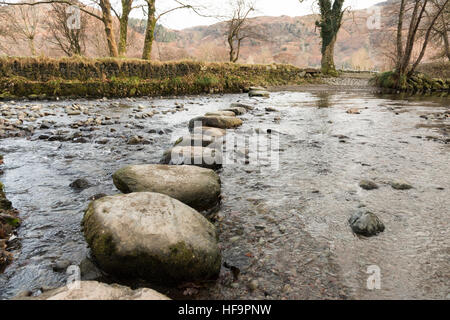Stepping stones across the river Derwent in Borrowdale the Lake District Cumbria UK Stock Photo