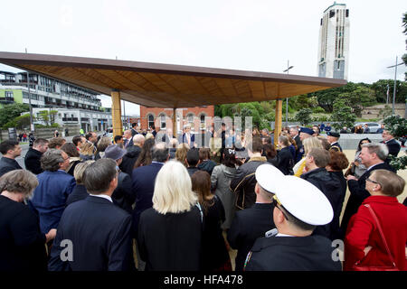 U.S. Secretary of State John Kerry thanks members of the U.S. Embassy Wellington staff on November 13, 2016, at the Pukeahu National War Memorial Park at Anzac Square in Wellington, New Zealand, after they helped arrange for him to lay a wreath at the Tomb of the Unknown Warrior, present U.S. medals to members of New Zealand’s armed forces who served alongside American troops, and dedicate the site of a new U.S. memorial in the park. Stock Photo