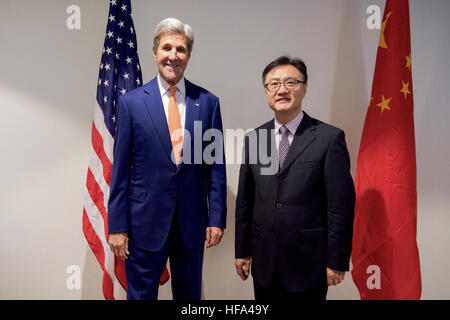 U.S. Secretary of State John Kerry, joined by U.S. Environmental Protection Agency Administrator Gina McCarthy, stands with Chinese Deputy Minister of Environmental Protection Zhai Qing before a bilateral meeting at the Radisson Blu Hotel in Kigali, Rwanda, on October 14, 2016, amid negotiations about amending the Montreal ozone layer protection protocol. Stock Photo