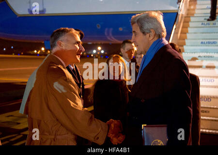 U.S. Secretary of State John Kerry speaks with U.S. Embassy to the Holy See Deputy Chief of Mission Lou Bono on December 1, 2016, as he arrives at Ciampino–G. B. Pastine International Airport in Rome, Italy, before attending a multinational meeting focused on Mediterranean issues as well as meetings at the Vatican. Stock Photo