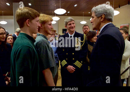 U.S. Secretary of State John Kerry greets a Naval attaché and his family after addressing staffers and their relatives at U.S. Embassy Berlin in Berlin, Germany, on December 5, 2016, before a bilateral meeting with German Foreign Minister Frank-Walter Steinmeier, and his receiving the Order of Merit from the German government. Stock Photo