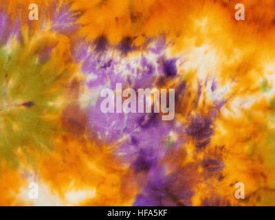 hand painted white silk scarf - orange and violet abstract nodular batik Stock Photo