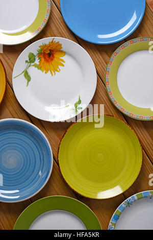 empty plates on the wooden table Stock Photo