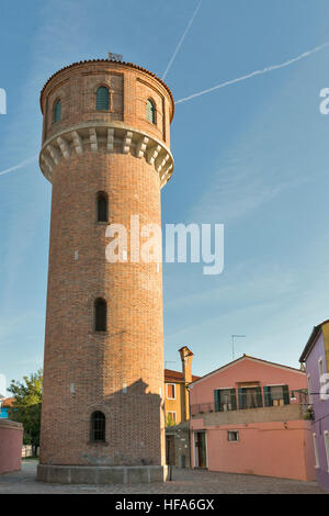 Old water supply tower on Burano island, Venice, Italy. Stock Photo