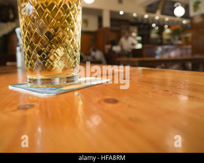 Apfelwein, hard cider or apple wine, a regional specialty in Hesse Germany served in  Geripptes glass in cozy inns all over Frankfurt am Main Stock Photo