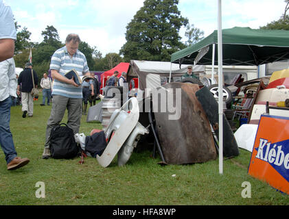 Classic car owners look through stalls of rare parts and automobilia at Beaulieu Autojumble Stock Photo