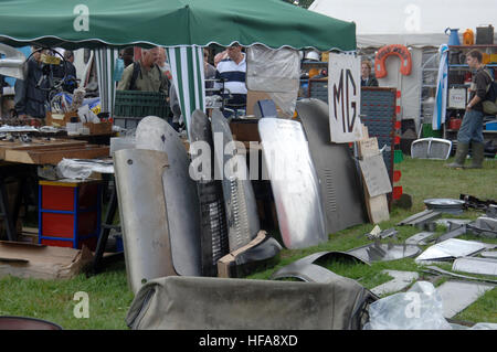 Classic car owners look through stalls of rare parts and automobilia at Beaulieu Autojumble Stock Photo