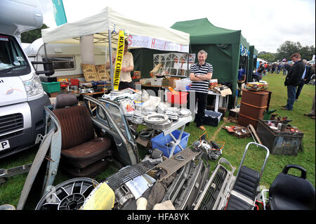 Classic car owners look through stalls of rare parts and automobilia at Beaulieu Autojumble Stock Photo