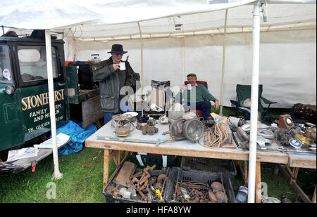 Classic car owners look through stalls of rare parts and automobilia at Beaulieu Autojumble Stock Photo