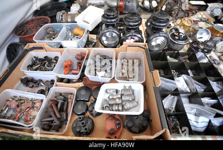 Classic car owners look through stalls of rare parts and automobilia at Beaulieu Autojumble Stock Photo