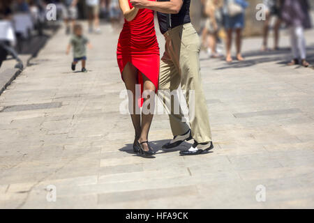 Street dancers performing tango in the street among the people Stock Photo