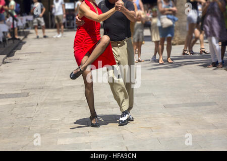 Street dancers performing tango in the street among the people Stock Photo