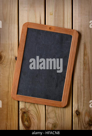 empty blackboard on the wooden table Stock Photo