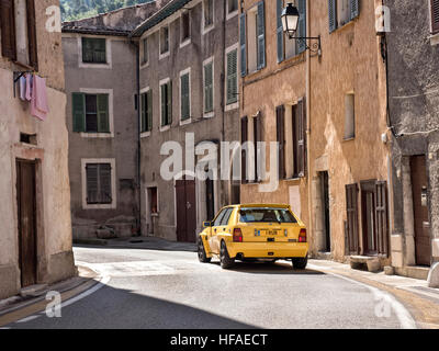 1995 Lancia Delta HF Integrale driving on roads in the French alps Stock Photo