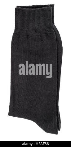 Black socks folded isolated on a white background. Clipping paths included. Stock Photo