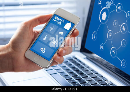 Smart home automation app interface on mobile phone to control house with artificial intelligence Stock Photo