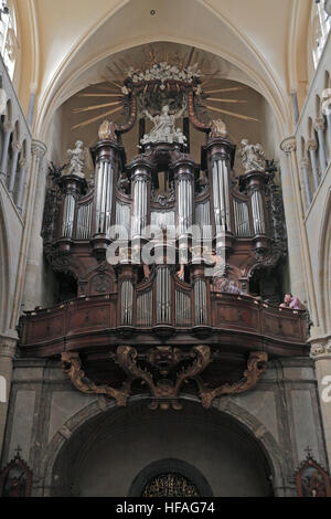 The pipe organ inside the Tongeren Basilica (Onze-Lieve-Vrouwe Basiliek) in Tongeren, Limburg, Belgium. Stock Photo