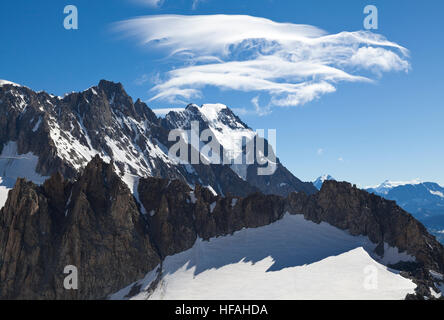 Panoramic view of Western alps with Giant's Tooth (Dent du Geant) from Helbronner roof of Europe in Aosta Valley region of Italy Stock Photo