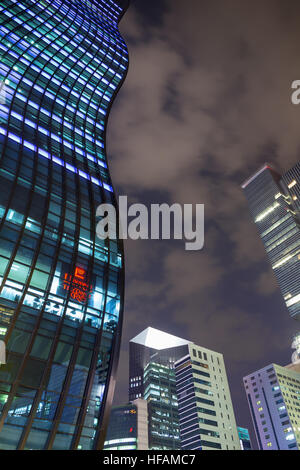 Lit GT Tower East (Seocho Garak Tower East) and other skyscrapers in the Gangnam District in Seoul, South Korea, at night. Stock Photo