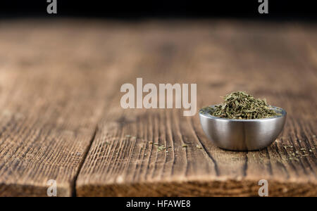 Old wooden table with dried Stevia leaves (close-up shot; selective focus) Stock Photo