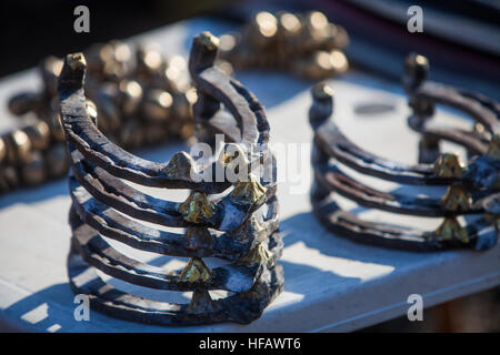 Close up image of a pile of horseshoes. Stock Photo