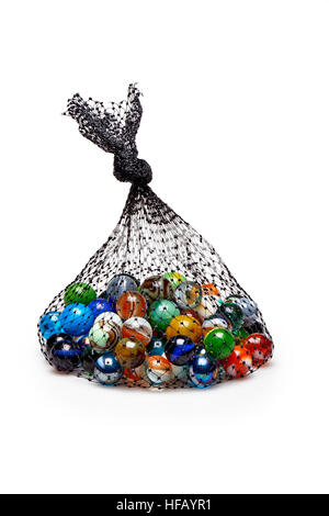 Bag of Multicolored marbles isolated on white background Stock Photo