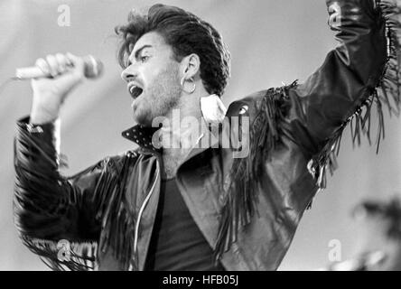 George Michael on stage at Wembley Stadium for the Wham! sell-out farewell concert. Stock Photo