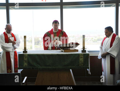 MARINE CORPS BASE CAMP PENDLETON, Calif (June 22, 2016) Bishop Neal J. Buckon, Bishop, Western Region Military Installations, and Auxiliary Bishop for the Office of the Archbishop for the Military Services conducts Catholic Mass in the Naval Hospital Camp Pendleton Chapel during a visit June 22, 2016.  Buckon also toured the hospital and visited patients.  The Archbishop for the Military Services endorses Catholic Priests for military chaplaincy, and represents Roman Catholics interests in the military to each of the military services. This visit was a part of a larger visit for the day, to Ma Stock Photo