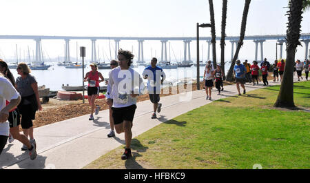 120520-N-SH505-085  SAN DIEGO (May 20, 2012) Participants in the Navy’s 26th Annual Coronado Bay Bridge Run/Walk run towards the finish line after crossing the Coronado Bay Bridge. More than 10,000 people participated in the event, sponsored by the Navy Region Southwest Morale, Welfare and Recreation Program, established to raise money to support quality of life programs for Navy personnel. (U.S. Navy photo by Mass Communication Specialist Seaman Jasmine Sheard/Released)  - Official U.S. Navy Imagery - Participants in the Navy%%%%%%%%%%%%%%%%E2%%%%%%%%%%%%%%%%80%%%%%%%%%%%%%%%%99s 26th Annual  Stock Photo