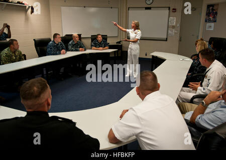 BUFFALO, N.Y. (Sept. 10, 2012) Rear Adm. Robin Graf, deputy commander of Navy Recruiting Command, speaks to Sailors at the Navy Operational Support Center in Buffalo, N.Y. This event was one of many scheduled during the Navy’s commemoration of the bicentennial of the War of 1812 in Buffalo. (U.S. Navy photo by Mass Communication Specialist 1st Class Davis Anderson/Released) 120910-N-HZ247-410  Join the conversation www.facebook.com/USNavy www.twitter.com/USNavy navylive.dodlive.mil  - Official U.S. Navy Imagery - Rear Adm. Graf speaks in Buffalo. (1) Stock Photo