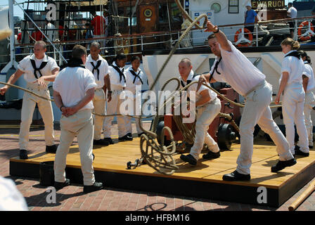 120616-N-CI293-031 BALTIMORE (June 16, 2012) Sailors assigned to USS Constitution prepare to simulate the firing of a cannon at Baltimore’s Inner Harbor during Baltimore Navy Week 2012. (U.S. Navy photo by Senior Chief Communications Specialist Susan Hammond/Released)  - Official U.S. Navy Imagery - Sailors assigned to USS Constitution prepare to simulate the firing of a cannon at Baltimore%%%%%%%%%%%%%%%%E2%%%%%%%%%%%%%%%%80%%%%%%%%%%%%%%%%99s Inner Harbor during Baltimore Navy Week 2012. Stock Photo