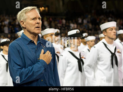 SAN DIEGO (Sept. 25, 2012) Secretary of the Navy (SECNAV) Ray Mabus sings along to the national anthem before a Major League Baseball game between the San Diego Padres and the Los Angeles Dodgers at Petco Park. Mabus conducted a reenlistment ceremony for 91 Sailors from the San Diego area and threw out the ceremonial first pitch. (U.S. Navy photo by Mass Communication Specialist 2nd Class Jonathan P. Idle/Released) 120925-N-VO377-237  Join the conversation www.facebook.com/USNavy www.twitter.com/USNavy navylive.dodlive.mil  - Official U.S. Navy Imagery - SECNAV honors the national anthem. Stock Photo