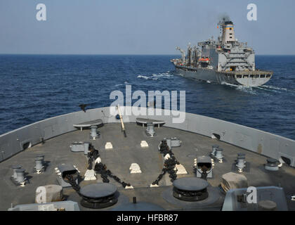 120907-N-NN926-022  GULF OF ADEN (Sept. 7, 2012) The amphibious transport dock ship USS New York (LPD 21) approaches the Military Sealift Command fleet replenishment oiler USNS Laramie (T-AO 203) for a replenishment at sea. New York is part of the Iwo Jima Amphibious Ready Group and is deployed in support of maritime security operations and theater security cooperation efforts in the U.S. 5th Fleet area of responsibility. (U.S. Navy photo by Mass Communication Specialist 2nd Class Zane Ecklund/Released)  - Official U.S. Navy Imagery - Ships conduct a replenishment at sea. (1) Stock Photo