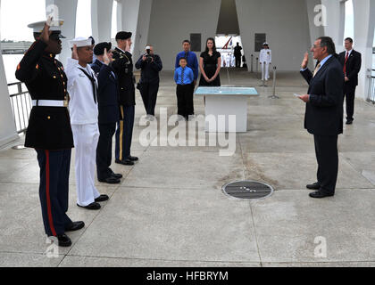 120309-N-IT566-076 PEARL HARBOR (March 9, 2012) Secretary of Defense (SECDEF) Leon Panetta performs a reenlistment ceremony at the USS Arizona Memorial for Marine Sgt. Pierre Barton, left, Petty Officer 1st Class Paul Barnachea, Senior Airman Seth Harrier, and Staff Sgt. Jason Lasley. Panetta is in Hawaii to participate in the U.S. Pacific Command change of command ceremony. (U.S. Navy photo by Mass Communication Specialist 2nd Class David Kolmel/Released)  - Official U.S. Navy Imagery - The SECDEF performs a reenlistment ceremony at the USS Arizona Memorial. Stock Photo