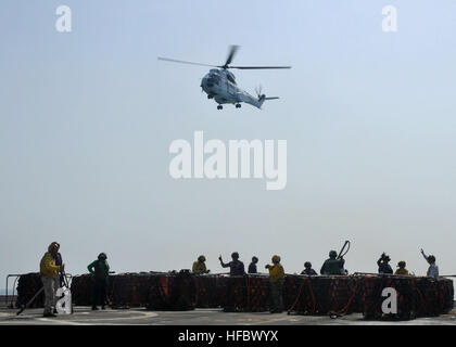 GULF OF ADEN (Sept. 8, 2012) Sailors and Marines prepare pallets to be airlifted to the Military Sealift Command fleet replenishment oiler USNS Laramie (T-AO 203) during a replenishment at sea aboard the amphibious transport dock ship USS New York (LPD 21). New York is part of the Iwo Jima Amphibious Ready Group with the embarked 24th Marine Expeditionary Unit (24th MEU) and is deployed in support of maritime security operations and theater security cooperation efforts in the U.S. 5th Fleet area of responsibility. (U.S. Navy photo by Mass Communication Specialist 2nd Class Zane Ecklund/Release Stock Photo