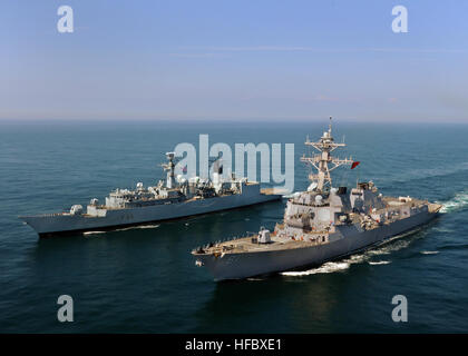 100602-N-1092P-432  ENGLISH CHANNEL (June 2, 2010) The Arleigh Burke-class destroyer USS Winston S. Churchill (DDG 81) and the Royal Navy frigate HMS Cumberland (F85) transit the English Chanel toward Portsmouth, England. (U.S. Navy photo by Mass Communication Specialist Seaman Stuart Phillips/Released)  - Official U.S. Navy Imagery - USS Winston S. Churchill and Royal Navy HMS Cumberland transit the English Chanel. Stock Photo